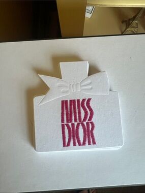 Dior White Perfume Bottle Card with Fuchsia Logo